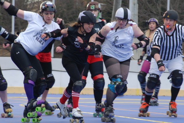 Zama's 'Killer Katanas' compete in 'Scar Wars' mash-up roller derby bout