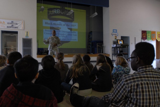Soldiers present black history of 101st to local school