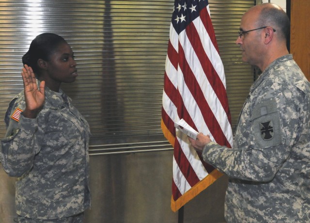 Jamaica-born Army Reserve Soldier reenlists, thanks spouse for support