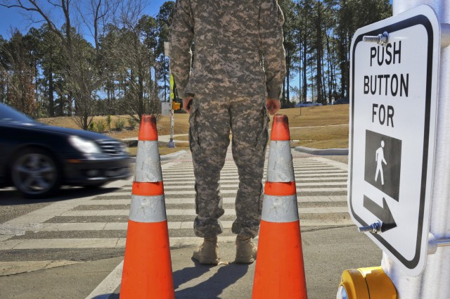 Give crosswalks, street signs 'right-of-way'