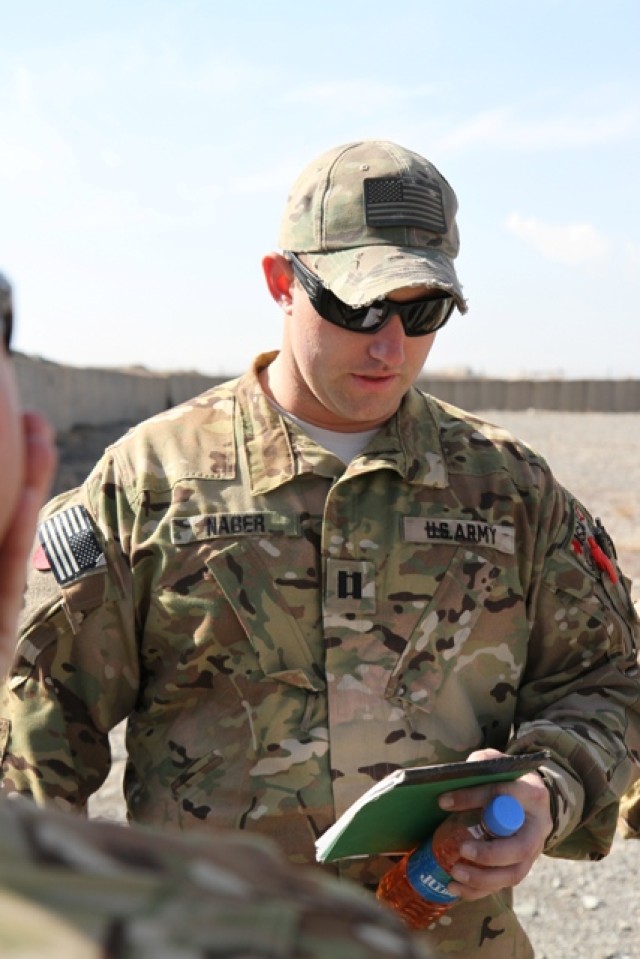 U.S. Army Capt. Jonathan Naber conducts pilot in command preflight checks