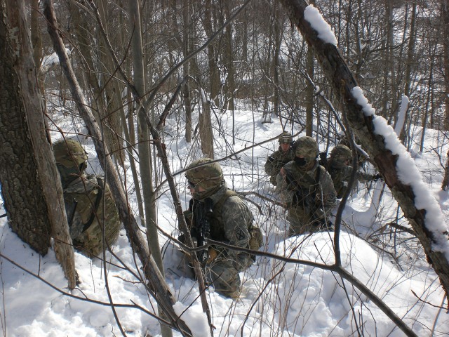 4-31 Infantry Soldiers conduct field training during winter storm