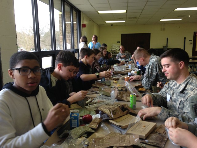 Soldiers serve up 'field food' to local students