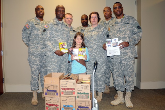 Daughter of ARL employee delivers Girl Scout cookies for deployed RDECOM Soldiers