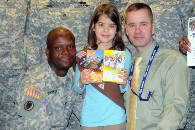 Daughter of ARL employee delivers Girl Scout cookies for deployed RDECOM Soldiers