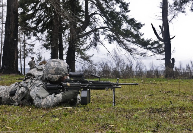 Field artillerymen learn infantry skills in squad live-fire exercise