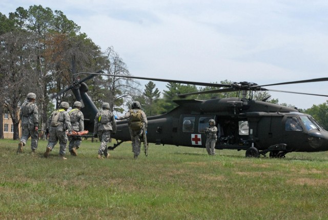 Fort Benning junior enlisted soldiers aid senior citizens during Vibrant Response