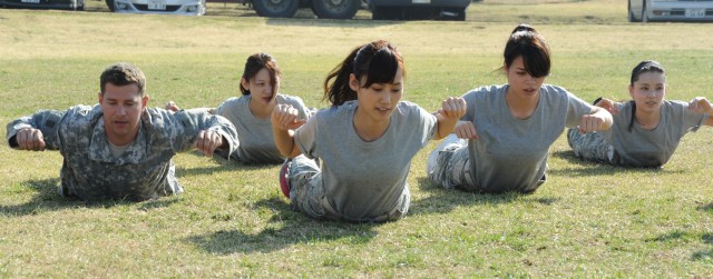 Japanese reality TV contestants experience Army life during filming at Camp Zama