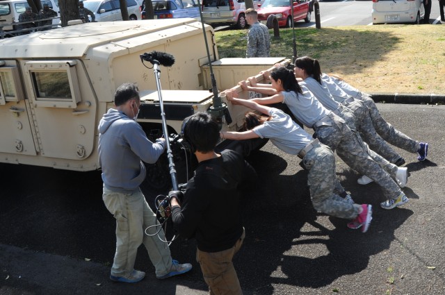 Japanese reality TV contestants experience Army life during filming at Camp Zama