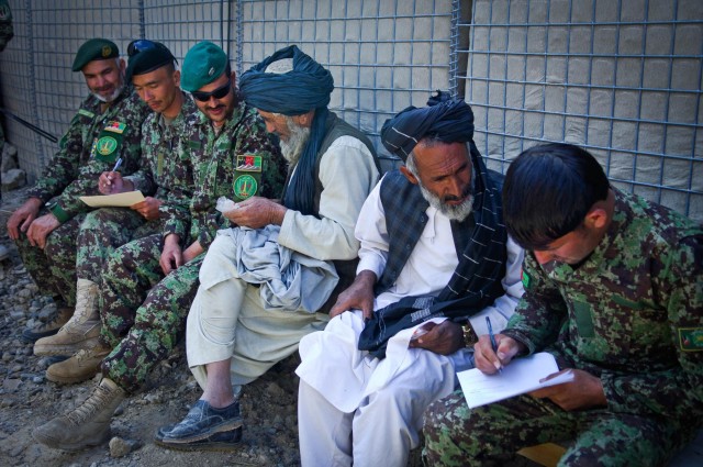 Afghans help locals with medical treatment