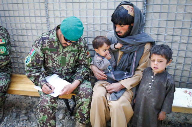 Afghans help locals with medical treatment