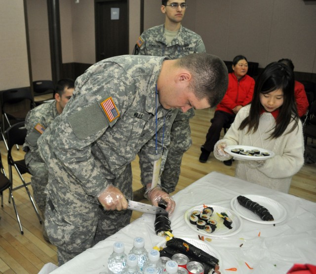 Service members deliver hospitality