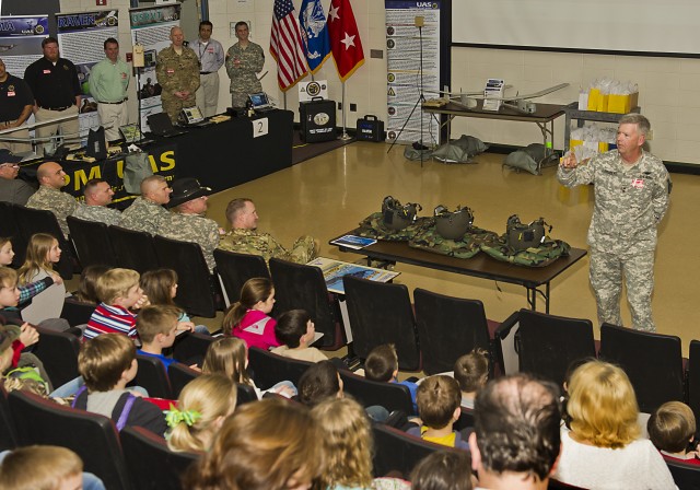 The PEO for Aviation addresses local students during career day presentations