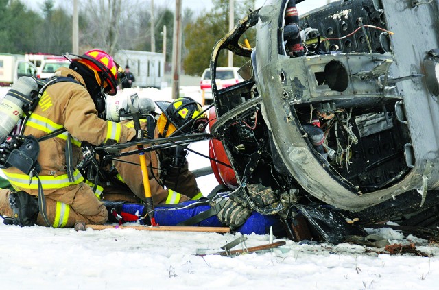 Fort Drum emergency personnel respond to simulated helicopter crash
