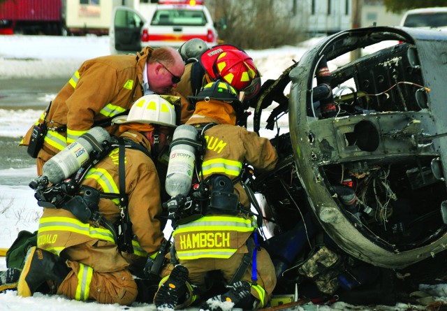 Fort Drum emergency personnel respond to simulated helicopter crash