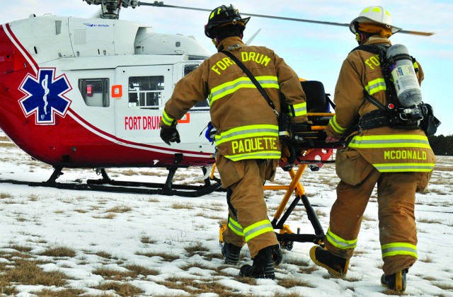 Fort Drum emergency personnel respond to simulated helicopter crash