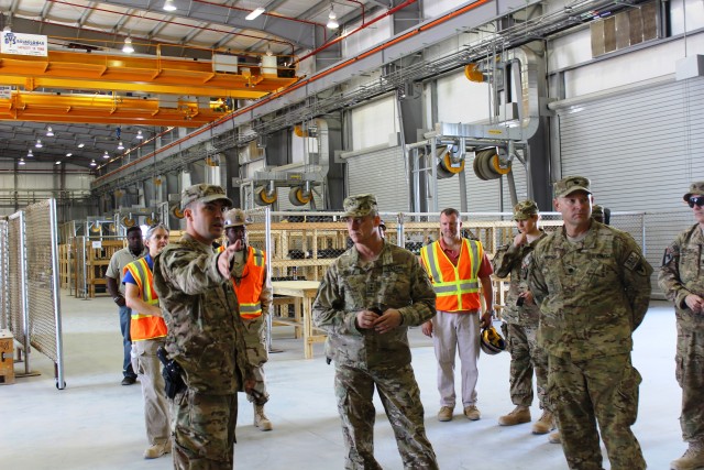 Capt. Lee Berry explains the benefits of new KAF RPAT to Maj. Gen. Kendall Cox