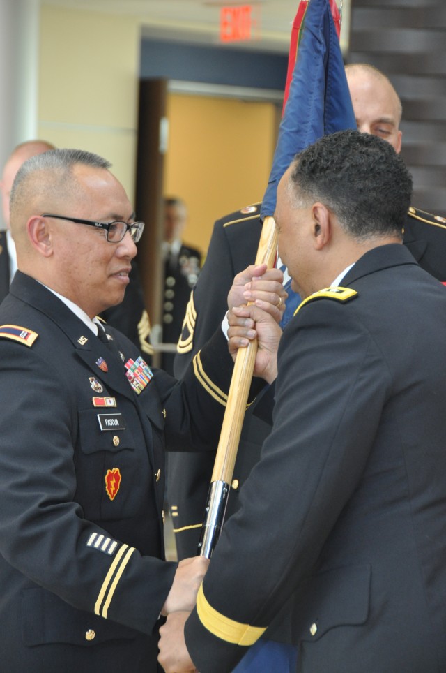 Chief Warrant Officer 4 Jesse O. Pascua assumed command of the Army Materiel Command Band 