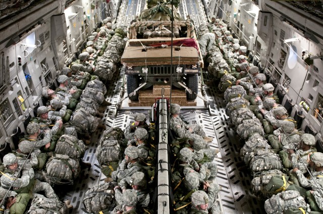 Paratroopers prepare for heavy drop