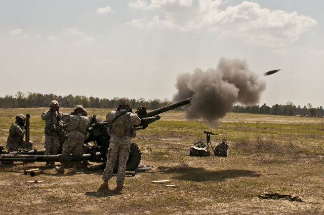 Black Falcons fire howitzer