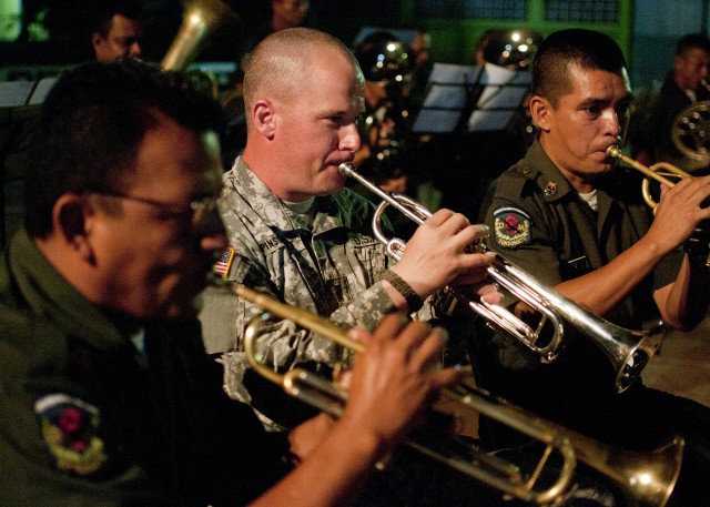 Army band commander performs with Salvadoran army band