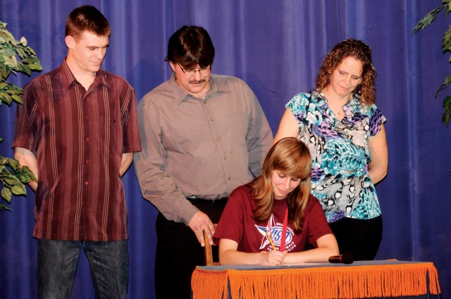 Furney signs scholarship with Columbus State