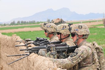 U.S., Afghan engineers build road through 'Taliban center of mass ...