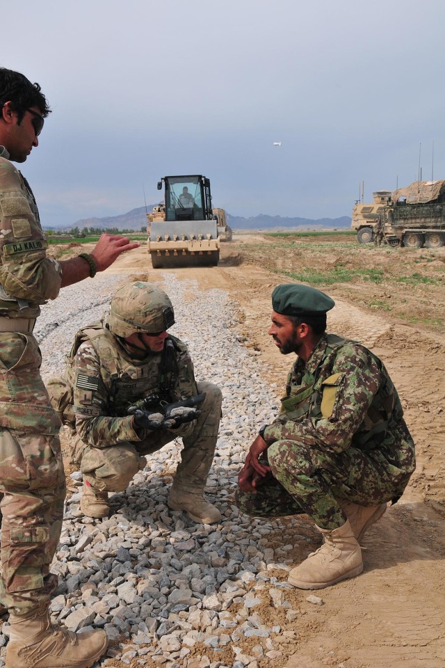 US, Afghan engineers build road through 'Taliban center of mass'