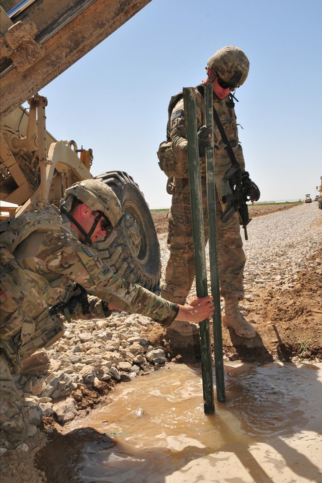 US, Afghan engineers build road through 'Taliban center of mass'