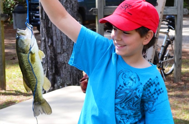 Fort Rucker youth reel in good time at lake opening