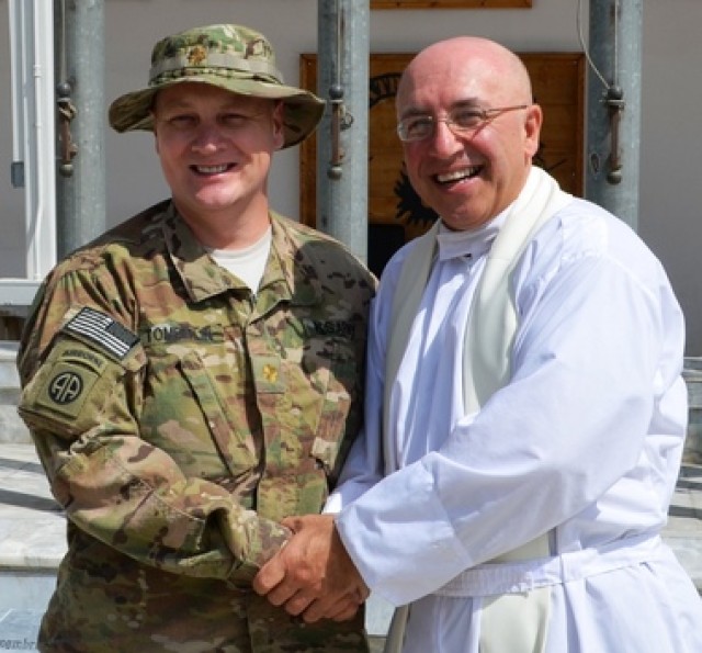 Major Michael Tomberlin and Chaplain Jerzy Rzasowski after his last Mass in Afghanistan