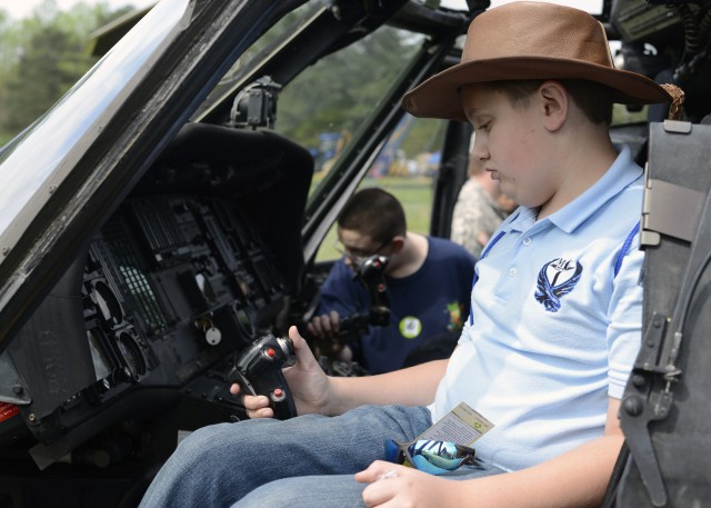 Thomas Skinner, a seventh-grade student at Massaponax Christian Academy, was one of the many students who tried the pilots seat during Fort A.P. Hill's Earth and Safety Day on April 18.