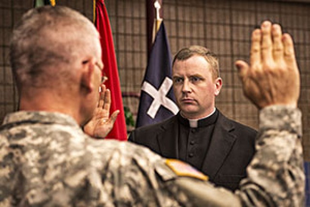 Monsignor Chad Gion is sworn in and commissioned as a 1st Lieutenant for the North Dakota National Guard 