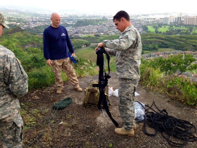 Broncos respond to community, save dog stuck on hillside