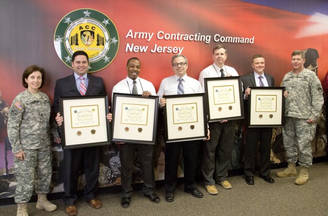 Contracting specialists complete 2-year Smart Buyer training program