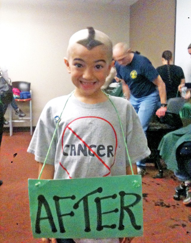 Head-shaving event sign of solidarity, sign of hope