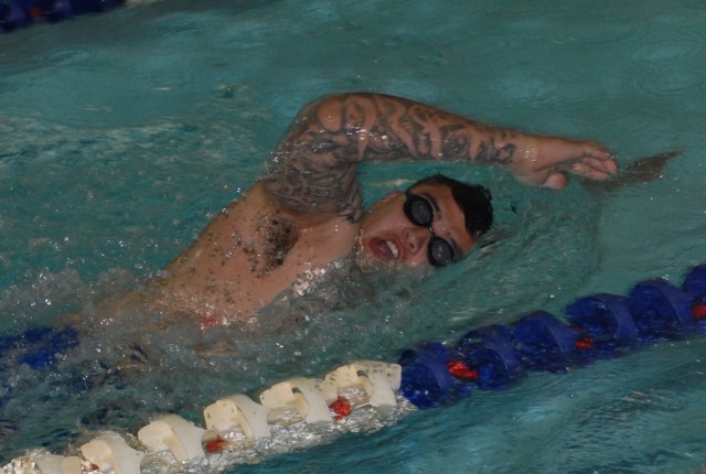 Spc. Quinton Picone Swims Laps During a Training Session