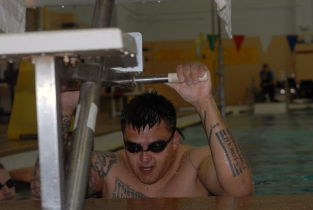 Spc. Quinton Picone Prepares To Launch for a Backstroke Lap