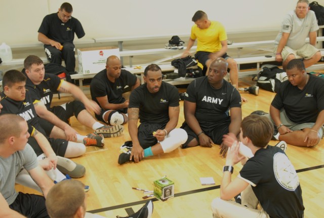 gt. Delvin Maston Listens to Coaching Staff During Sitting Volleyball Practice