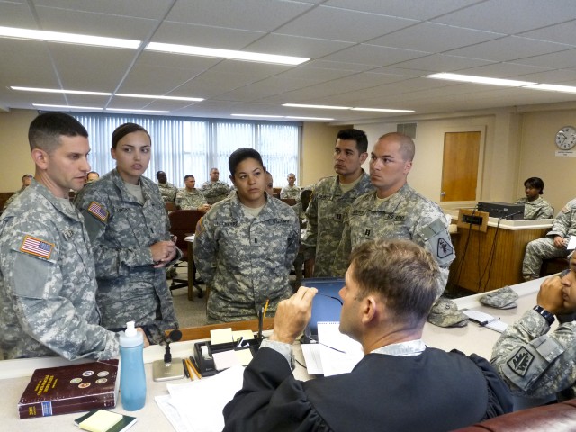 Army Reserve Legal, military police Soldiers train together during real-world scenarios