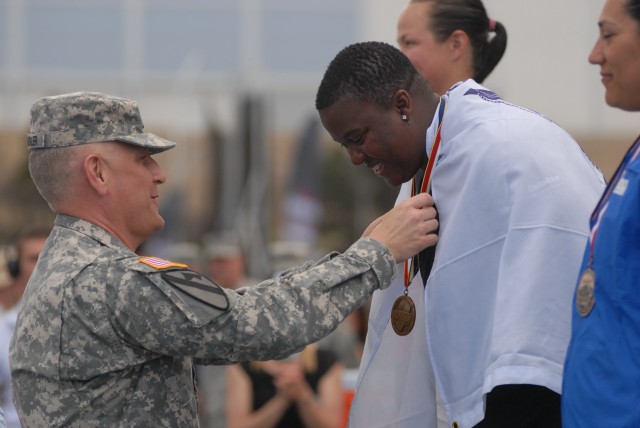 Sgt. Maj. of the Army awards Sgt. Monica Southall with Warrior Games track and field gold medal