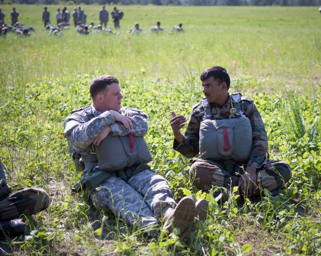 Indian, US Paratroopers make helicopter jump
