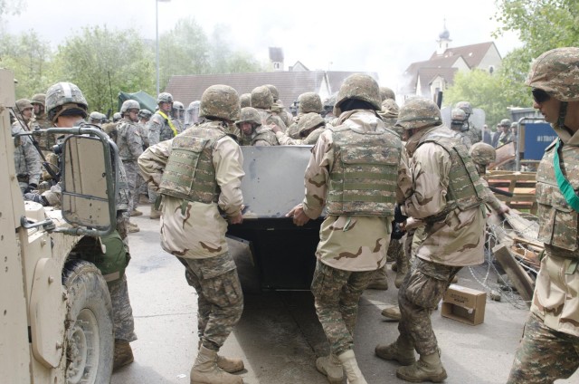 Troops complete training, head to Kosovo