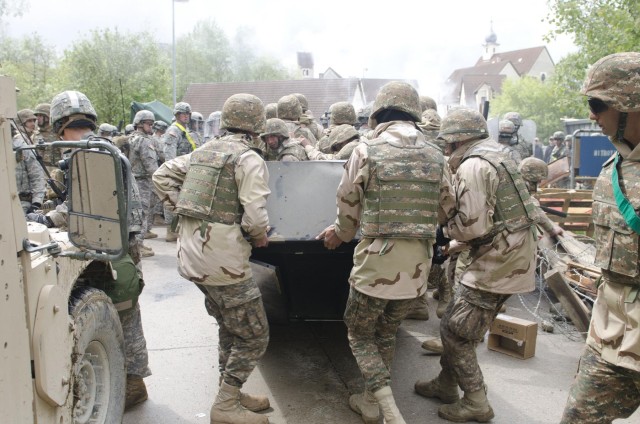 Troops complete training, head to Kosovo