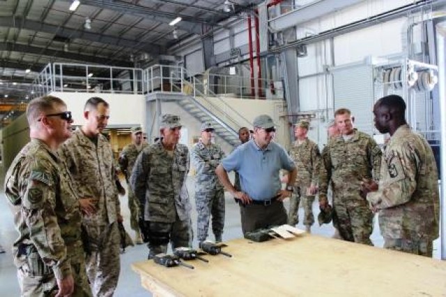 1st Lt. Daniel Edomwandagbon briefs briefs Assistant Secretary of Defense for Logistics & Materiel Readiness