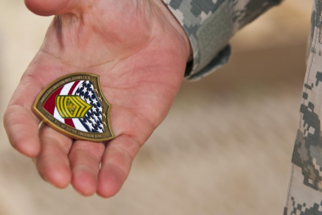 Sergeant major of the Army presents coin of excellence