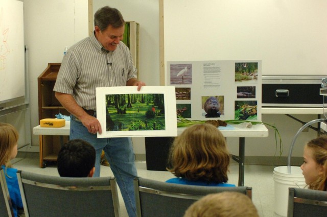 Corps personnel help junior gardeners grow