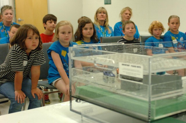 Corps personnel help junior gardeners grow