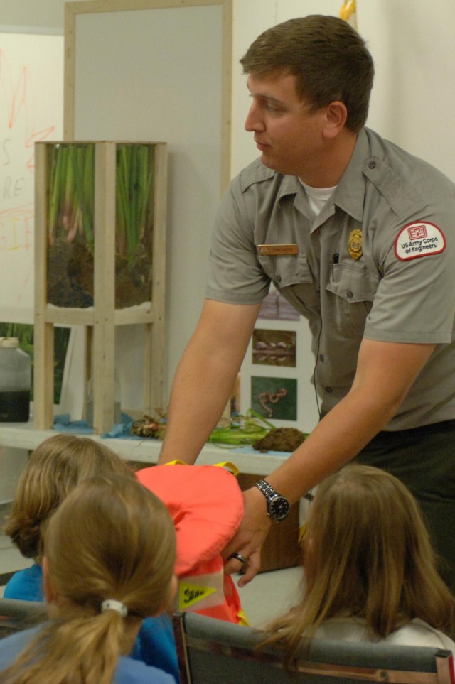 Corps personnel help junior gardeners grow