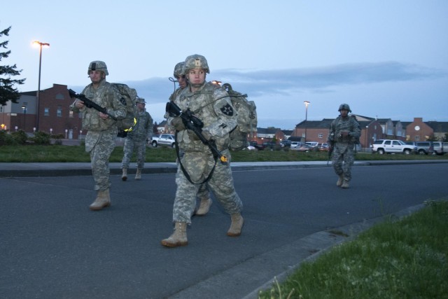 Soldier and noncommissioned officer seize the highground